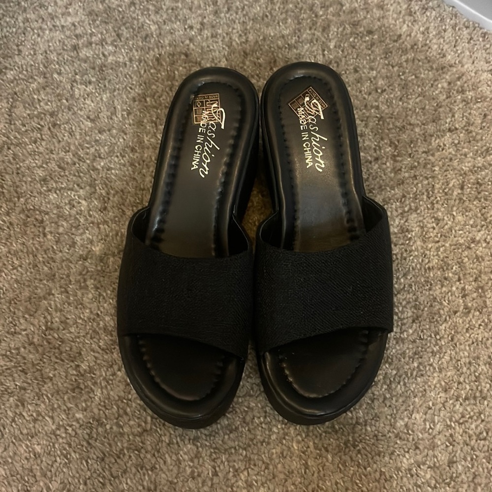 Black platforms. Never worn NWOT
